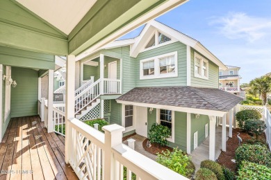 Unwind on your screened porch with front-row views of Davis on Ocean Creek Golf Course in South Carolina - for sale on GolfHomes.com, golf home, golf lot