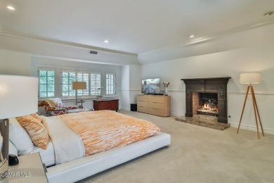 Nestled on a serene, tree-lined street in the prestigious on North Ranch Country Club in California - for sale on GolfHomes.com, golf home, golf lot