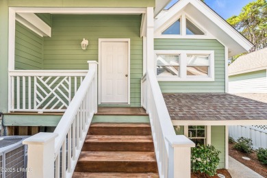Unwind on your screened porch with front-row views of Davis on Ocean Creek Golf Course in South Carolina - for sale on GolfHomes.com, golf home, golf lot