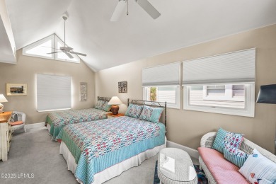 Unwind on your screened porch with front-row views of Davis on Ocean Creek Golf Course in South Carolina - for sale on GolfHomes.com, golf home, golf lot
