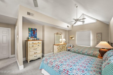 Unwind on your screened porch with front-row views of Davis on Ocean Creek Golf Course in South Carolina - for sale on GolfHomes.com, golf home, golf lot