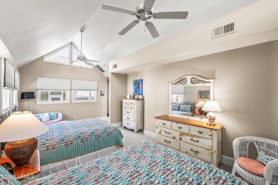 Unwind on your screened porch with front-row views of Davis on Ocean Creek Golf Course in South Carolina - for sale on GolfHomes.com, golf home, golf lot