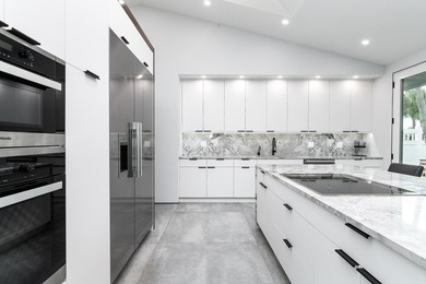 Stunning Fully Renovated 3BR + Office/4BA Pool Home in on  in Florida - for sale on GolfHomes.com, golf home, golf lot