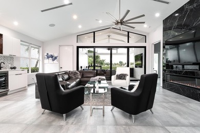 Stunning Fully Renovated 3BR + Office/4BA Pool Home in on  in Florida - for sale on GolfHomes.com, golf home, golf lot