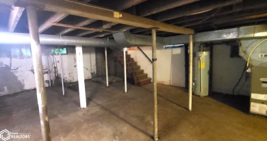This property is an excellent investment opportunity for fix and on Aurelia Golf Club in Iowa - for sale on GolfHomes.com, golf home, golf lot