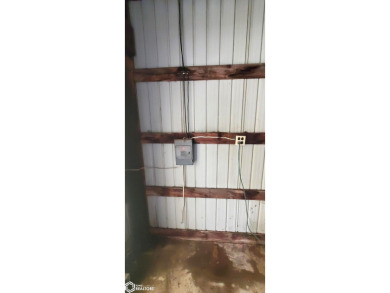 This property is an excellent investment opportunity for fix and on Aurelia Golf Club in Iowa - for sale on GolfHomes.com, golf home, golf lot
