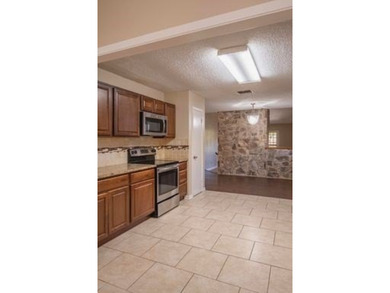 3/3 home on the Riverhill golf course that overlooks Fairway #13 on Riverhill Country Club in Texas - for sale on GolfHomes.com, golf home, golf lot