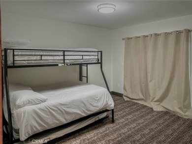 Step into a world of elegance and modern architecture with this on Big Bear Mountain Ski and Golf Resort in California - for sale on GolfHomes.com, golf home, golf lot