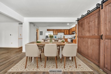 This move-in ready 2 bedroom, 2 bath flat is nestled in on Hunting Hills Country Club in Virginia - for sale on GolfHomes.com, golf home, golf lot