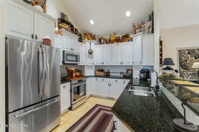 Where the greens meet the Great Smokies, this meticulously on Creekside Plantation in Tennessee - for sale on GolfHomes.com, golf home, golf lot