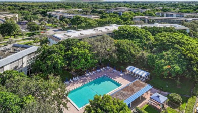 Discover this beautifully renovated 2-bed, 2-bath condo in the on Wynmoor Golf Course in Florida - for sale on GolfHomes.com, golf home, golf lot