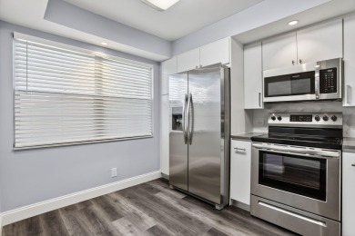 Discover this beautifully renovated 2-bed, 2-bath condo in the on Wynmoor Golf Course in Florida - for sale on GolfHomes.com, golf home, golf lot