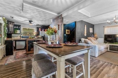 Unique and full of charm, this home sits on four lots totaling 2 on Terre Du Lac Golf and Country Club in Missouri - for sale on GolfHomes.com, golf home, golf lot