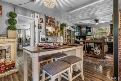 Unique and full of charm, this home sits on four lots totaling 2 on Terre Du Lac Golf and Country Club in Missouri - for sale on GolfHomes.com, golf home, golf lot