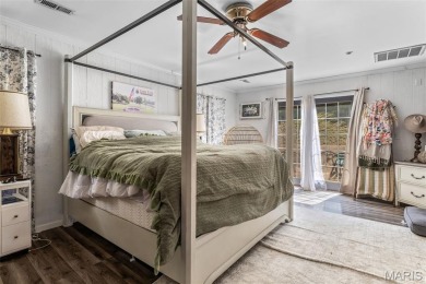 Unique and full of charm, this home sits on four lots totaling 2 on Terre Du Lac Golf and Country Club in Missouri - for sale on GolfHomes.com, golf home, golf lot