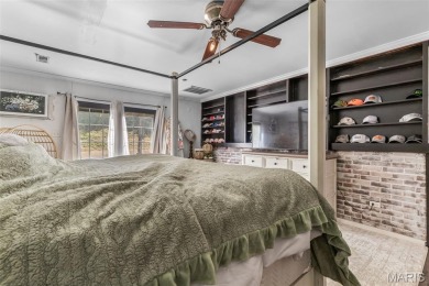 Unique and full of charm, this home sits on four lots totaling 2 on Terre Du Lac Golf and Country Club in Missouri - for sale on GolfHomes.com, golf home, golf lot