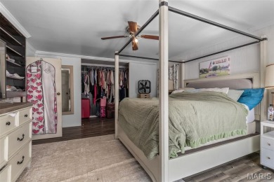 Unique and full of charm, this home sits on four lots totaling 2 on Terre Du Lac Golf and Country Club in Missouri - for sale on GolfHomes.com, golf home, golf lot