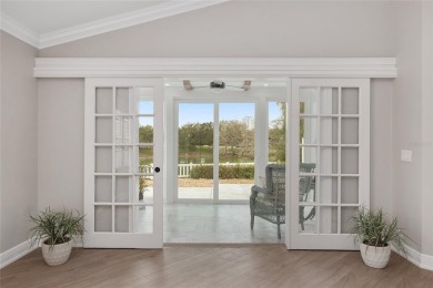 This CUSTOM Amelia courtyard villa, offering 2 Bedrooms and a on The Links of Spruce Creek in Florida - for sale on GolfHomes.com, golf home, golf lot