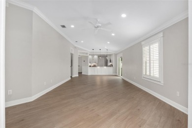 This CUSTOM Amelia courtyard villa, offering 2 Bedrooms and a on The Links of Spruce Creek in Florida - for sale on GolfHomes.com, golf home, golf lot