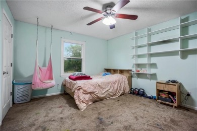 Welcome to this stunning 4-bedroom (1NC), 2.5 bath home sitting on Gardner Golf Course in Kansas - for sale on GolfHomes.com, golf home, golf lot