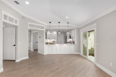 This CUSTOM Amelia courtyard villa, offering 2 Bedrooms and a on The Links of Spruce Creek in Florida - for sale on GolfHomes.com, golf home, golf lot