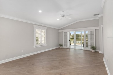 This CUSTOM Amelia courtyard villa, offering 2 Bedrooms and a on The Links of Spruce Creek in Florida - for sale on GolfHomes.com, golf home, golf lot