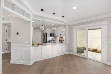 This CUSTOM Amelia courtyard villa, offering 2 Bedrooms and a on The Links of Spruce Creek in Florida - for sale on GolfHomes.com, golf home, golf lot