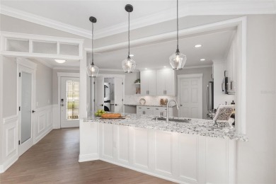 This CUSTOM Amelia courtyard villa, offering 2 Bedrooms and a on The Links of Spruce Creek in Florida - for sale on GolfHomes.com, golf home, golf lot