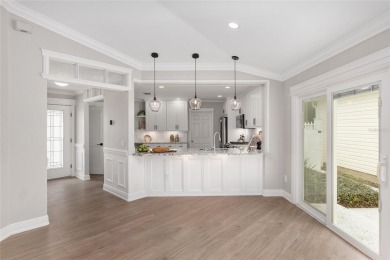 This CUSTOM Amelia courtyard villa, offering 2 Bedrooms and a on The Links of Spruce Creek in Florida - for sale on GolfHomes.com, golf home, golf lot