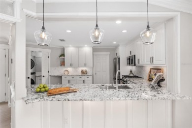 This CUSTOM Amelia courtyard villa, offering 2 Bedrooms and a on The Links of Spruce Creek in Florida - for sale on GolfHomes.com, golf home, golf lot