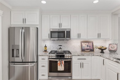This CUSTOM Amelia courtyard villa, offering 2 Bedrooms and a on The Links of Spruce Creek in Florida - for sale on GolfHomes.com, golf home, golf lot