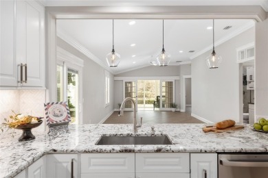 This CUSTOM Amelia courtyard villa, offering 2 Bedrooms and a on The Links of Spruce Creek in Florida - for sale on GolfHomes.com, golf home, golf lot