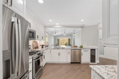 This CUSTOM Amelia courtyard villa, offering 2 Bedrooms and a on The Links of Spruce Creek in Florida - for sale on GolfHomes.com, golf home, golf lot
