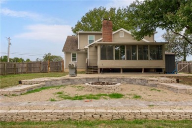 Welcome to this stunning 4-bedroom (1NC), 2.5 bath home sitting on Gardner Golf Course in Kansas - for sale on GolfHomes.com, golf home, golf lot