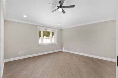 This CUSTOM Amelia courtyard villa, offering 2 Bedrooms and a on The Links of Spruce Creek in Florida - for sale on GolfHomes.com, golf home, golf lot
