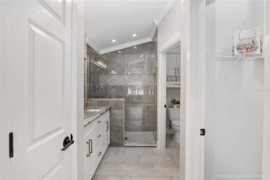 This CUSTOM Amelia courtyard villa, offering 2 Bedrooms and a on The Links of Spruce Creek in Florida - for sale on GolfHomes.com, golf home, golf lot