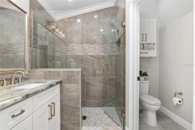 This CUSTOM Amelia courtyard villa, offering 2 Bedrooms and a on The Links of Spruce Creek in Florida - for sale on GolfHomes.com, golf home, golf lot