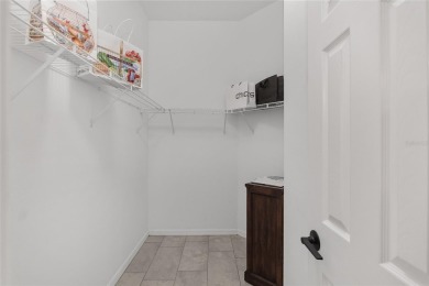 This CUSTOM Amelia courtyard villa, offering 2 Bedrooms and a on The Links of Spruce Creek in Florida - for sale on GolfHomes.com, golf home, golf lot