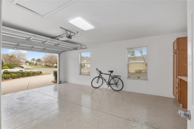 This CUSTOM Amelia courtyard villa, offering 2 Bedrooms and a on The Links of Spruce Creek in Florida - for sale on GolfHomes.com, golf home, golf lot