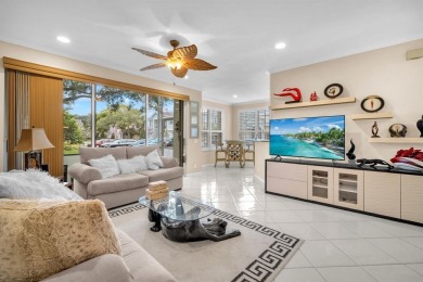 WAKE UP TO SERENE GARDEN VIEWS & INDULGE IN RESORT STYLE on TPC Eagle Trace in Florida - for sale on GolfHomes.com, golf home, golf lot