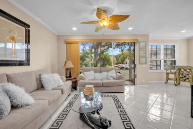 WAKE UP TO SERENE GARDEN VIEWS & INDULGE IN RESORT STYLE on TPC Eagle Trace in Florida - for sale on GolfHomes.com, golf home, golf lot