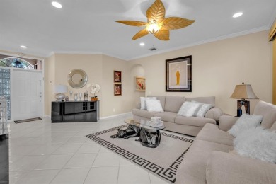 WAKE UP TO SERENE GARDEN VIEWS & INDULGE IN RESORT STYLE on TPC Eagle Trace in Florida - for sale on GolfHomes.com, golf home, golf lot