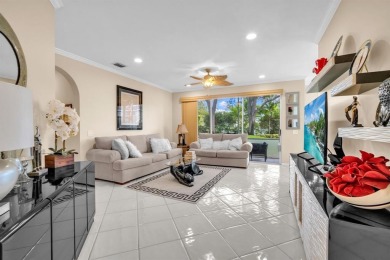 WAKE UP TO SERENE GARDEN VIEWS & INDULGE IN RESORT STYLE on TPC Eagle Trace in Florida - for sale on GolfHomes.com, golf home, golf lot