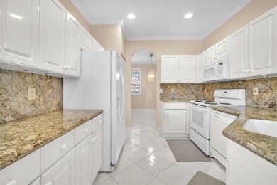 WAKE UP TO SERENE GARDEN VIEWS & INDULGE IN RESORT STYLE on TPC Eagle Trace in Florida - for sale on GolfHomes.com, golf home, golf lot