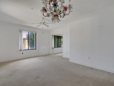 Discover this spacious 2-bedroom, 2-bathroom condo located on on Miles Grant Country Club in Florida - for sale on GolfHomes.com, golf home, golf lot