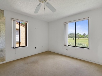 Discover this spacious 2-bedroom, 2-bathroom condo located on on Miles Grant Country Club in Florida - for sale on GolfHomes.com, golf home, golf lot