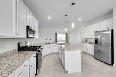 NEED A 3-CAR GARAGE? This contemporary lake view home has 4 on Babcock National Golf Course in Florida - for sale on GolfHomes.com, golf home, golf lot