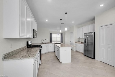 NEED A 3-CAR GARAGE? This contemporary lake view home has 4 on Babcock National Golf Course in Florida - for sale on GolfHomes.com, golf home, golf lot