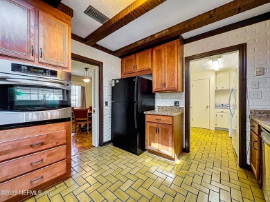 Just steps from the prestigious Timuquana Country Club, this on Timuquana Country Club in Florida - for sale on GolfHomes.com, golf home, golf lot
