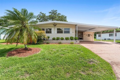 Welcome to this beautifully maintained 2-bedroom, 2-bathroom on Zellwood Station Country Club in Florida - for sale on GolfHomes.com, golf home, golf lot